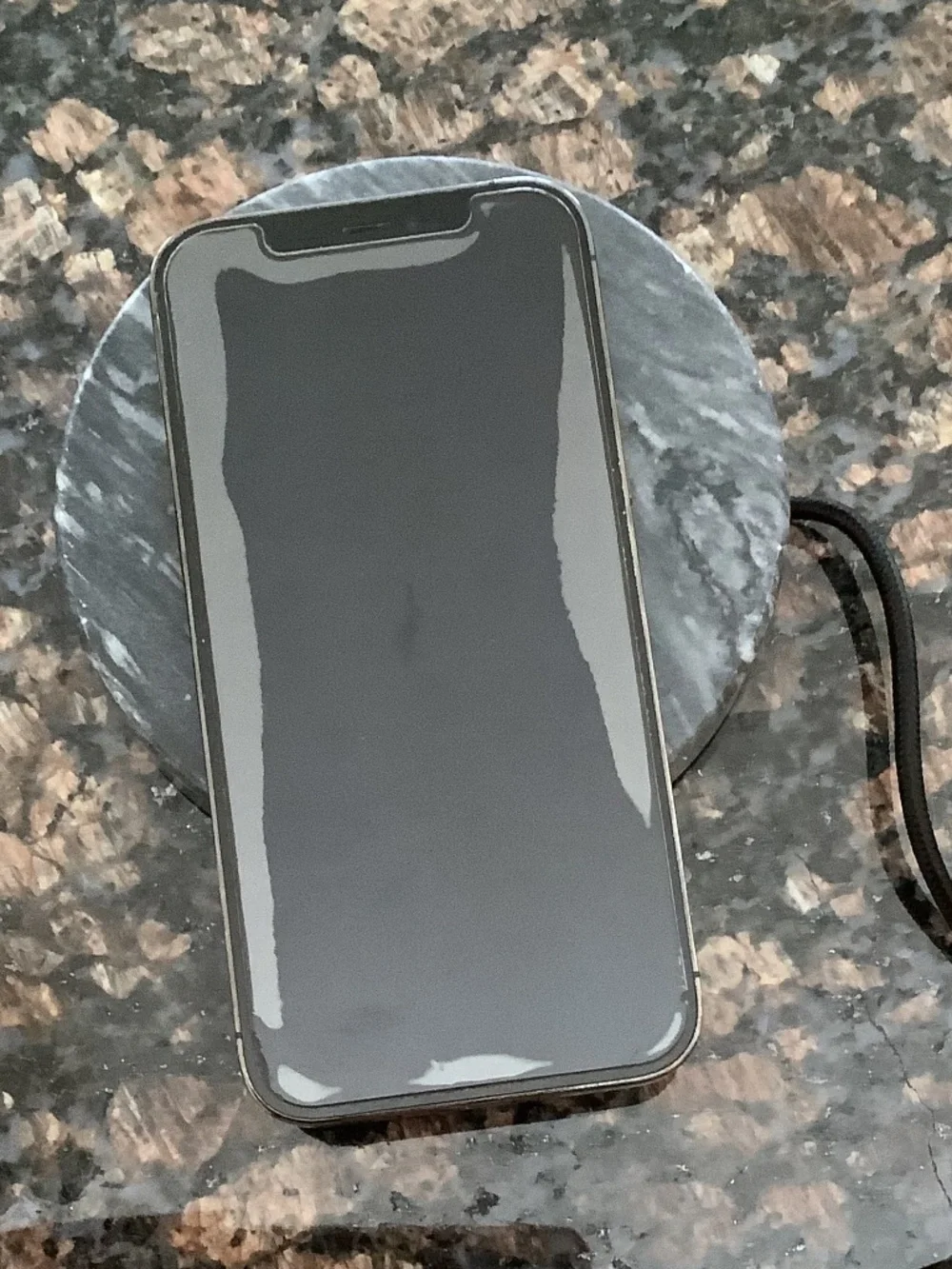 Wireless charging stone for cell phone